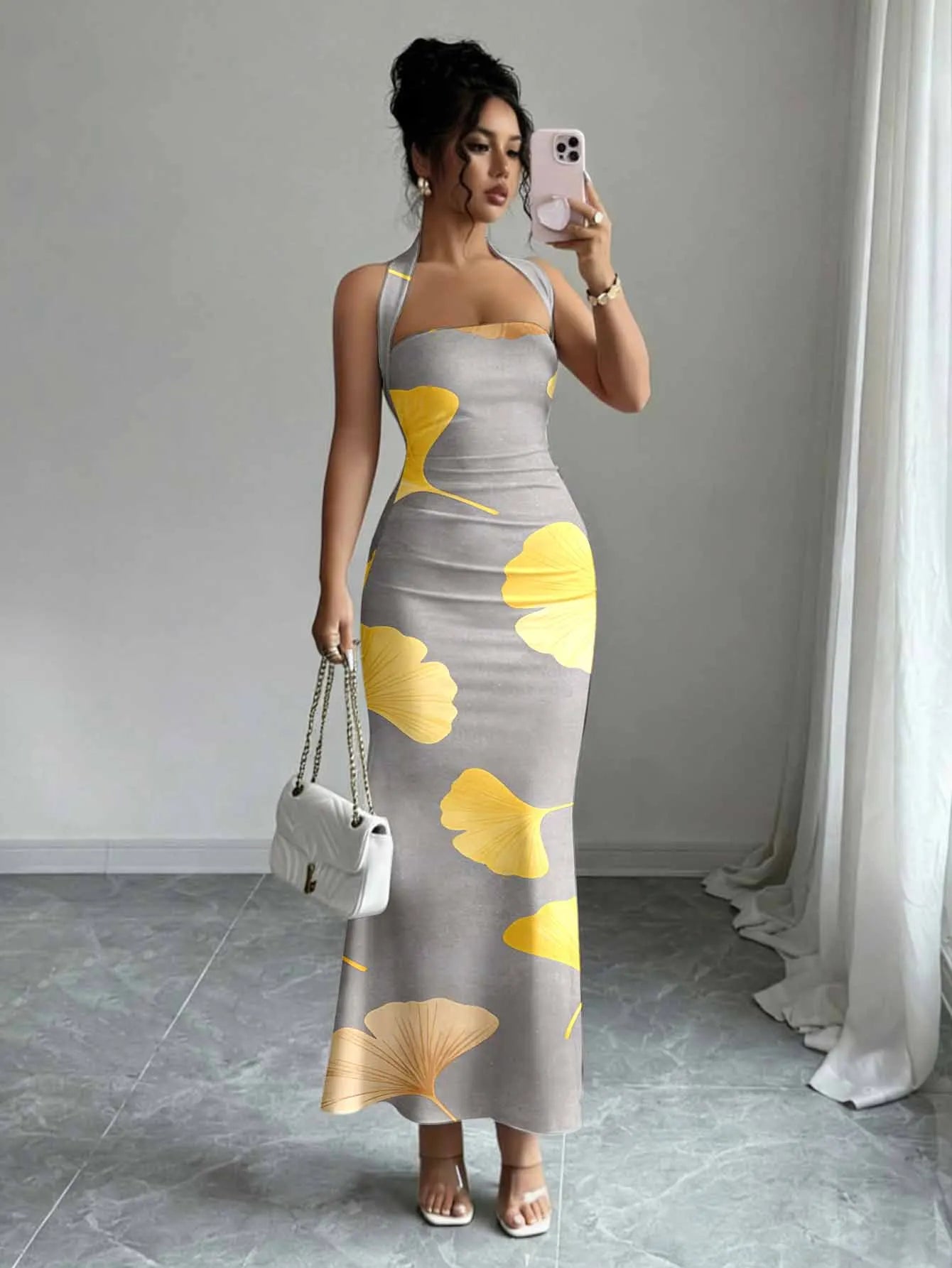 Hip-Hugging Sleeveless Long Skirt with Hanging Neck Design