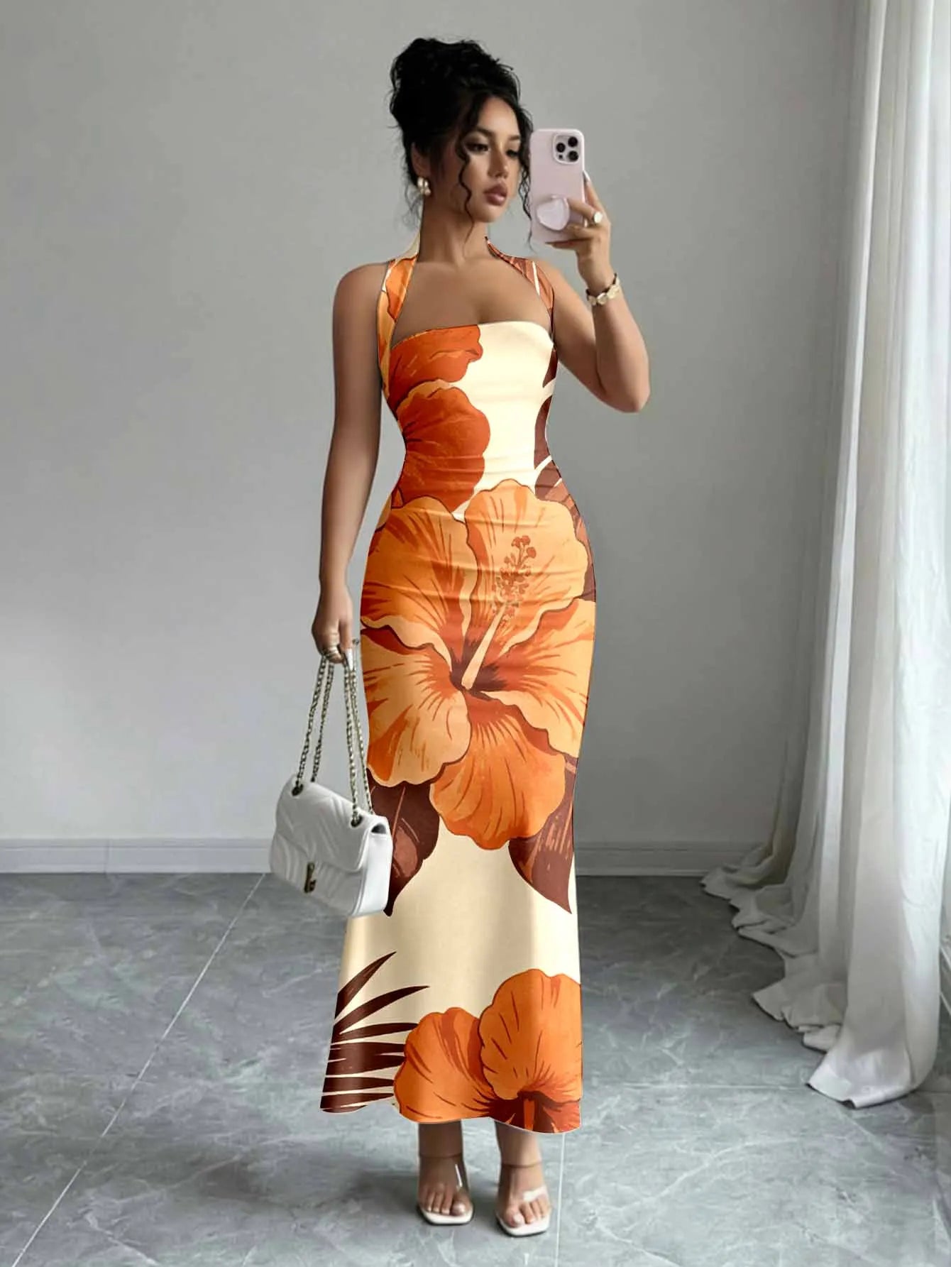 Hip-Hugging Sleeveless Long Skirt with Hanging Neck Design